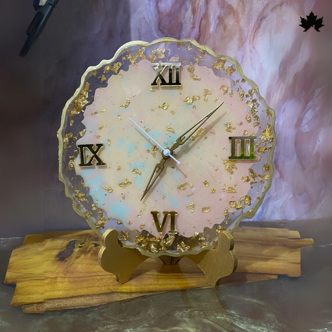 Blush Elegance designer table clock in blush resin with gold leaf accents and gold stand