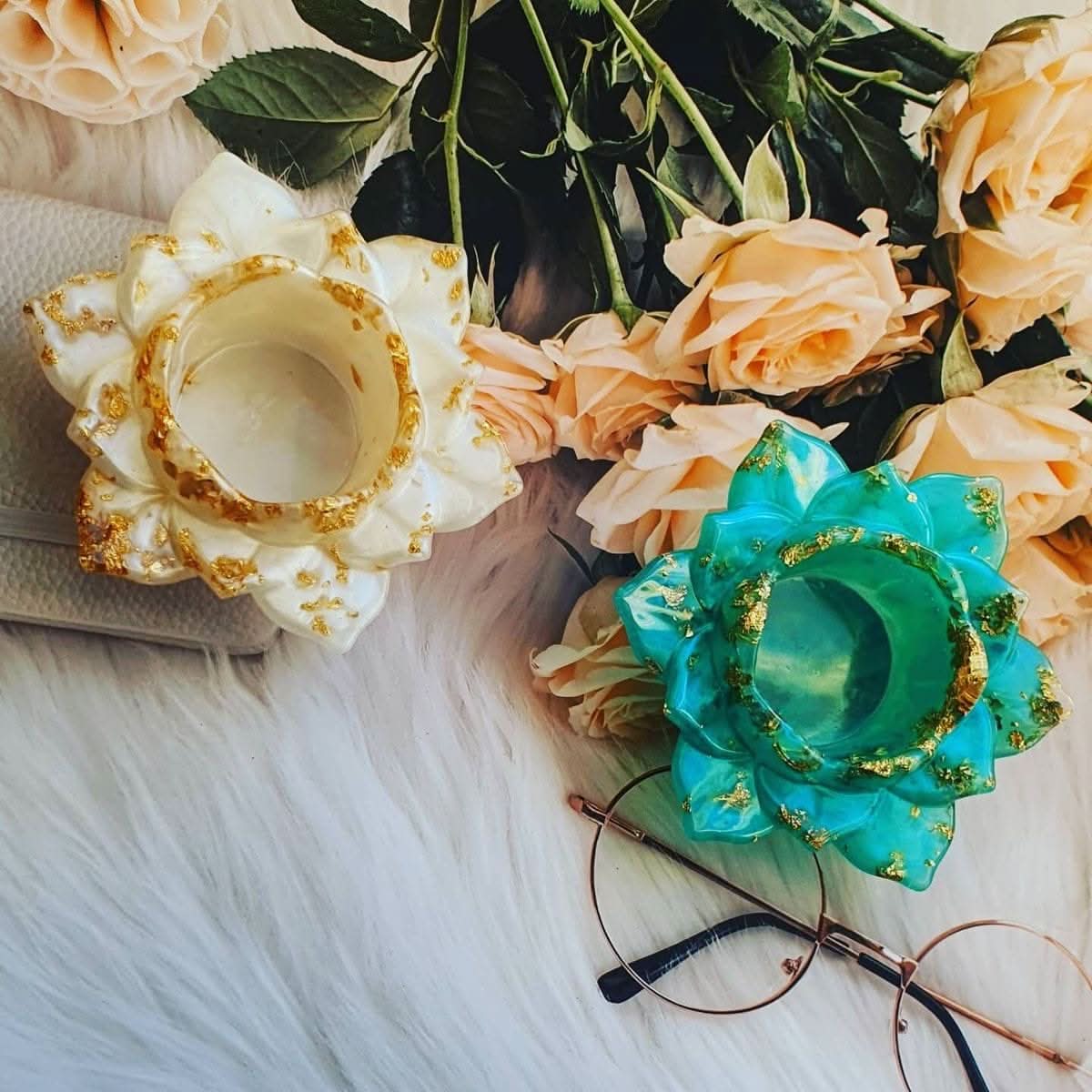 Floral Radiance resin tealight holders in ivory and turquoise with gold flake detailing