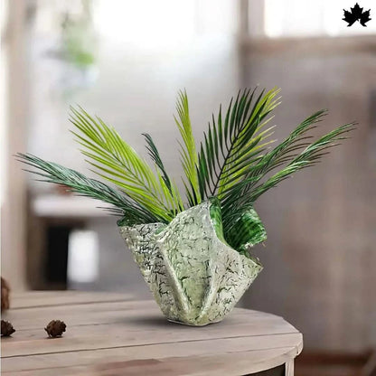 Artisan Folded Leaf resin planter with organic folded-leaf texture