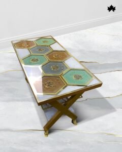 Elegant console table featuring a geometric honeycomb design with hexagonal tiles in shades of turquoise, gold, and brown, each bordered in gold. The table stands on a golden X-frame with caster wheels, showcasing a luxurious and modern aesthetic. This piece is positioned on a glossy marble floor, reflecting its polished surface and intricate details.