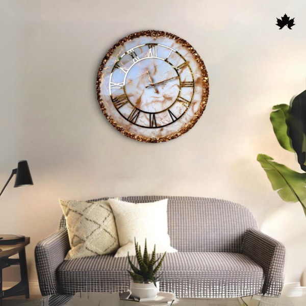 A luxurious handcrafted Art wall clock from Fankaarlok, named Verdant Majesty, featuring a marble-style face encircled by intricate golden branches, elegantly complementing a modern living room setting.