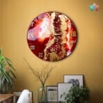 A stunning Mesmerizing Handcrafted Art wall clock featuring a bold, red and gold palette with a roman numeral dial, set against a warmly decorated room, enhancing its vibrant, artistic design.