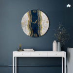 Midnight Cascade - Living Room Clock features a stunning deep blue and gold design, accented with textured, wave-like patterns that mimic a flowing river under moonlight. This artistic wall clock merges functionality with modern art, making it a captivating focal point for any living space.