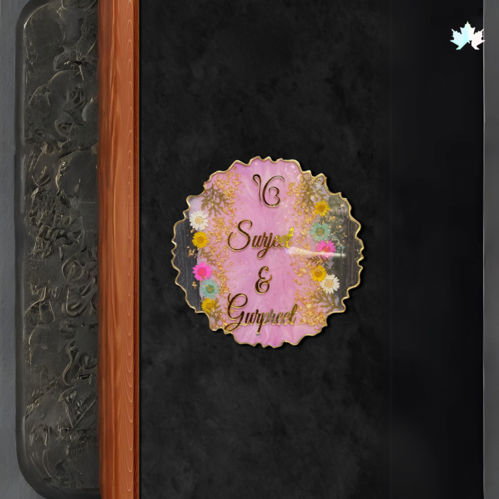 Handcrafted Regal Blossom Nameplate with floral motif and golden accents on a vintage pink backdrop