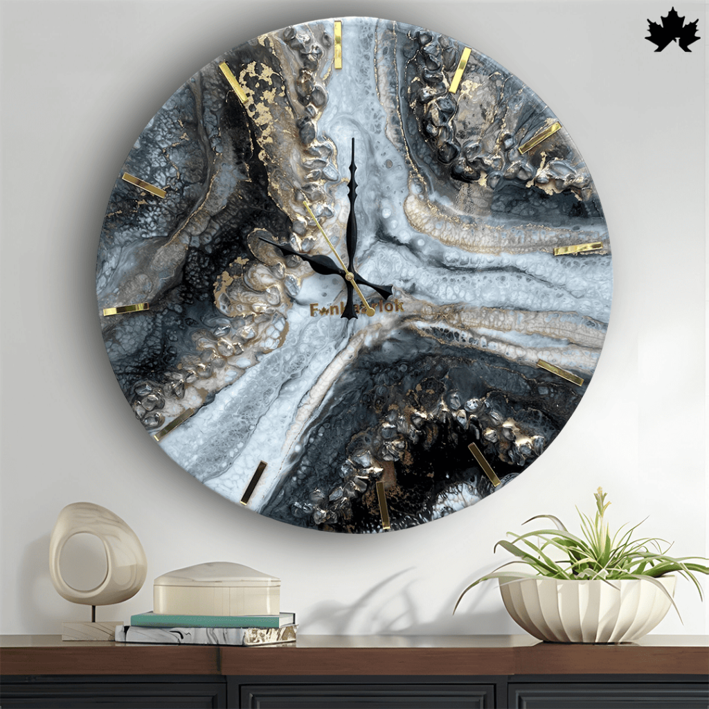 A decorative round wall clock named Silver Lining Geode Unique Wall Clock Design from Fankaarlok, featuring an intricate geode design in shades of grey and black, accented with golden lines, perfect for modern home decor.