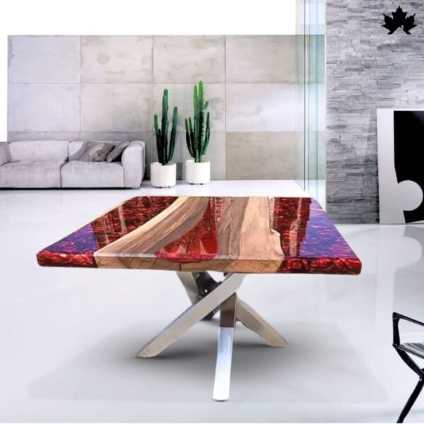 Stylish modern dining table featuring an innovative triangular design with natural wood and vibrant red resin art. The table sits on a sleek, metallic X-shaped base, displayed in a minimalist room with gray furnishings and cactus plants in white pots, blending contemporary style with artistic flair. Luxury Resin Wood Dining Table