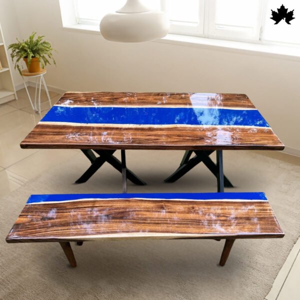 The image showcases a striking set of Wood table with bench featuring a deep blue resin inlay that resembles a serene water body. The natural wood edges of the tables contrast beautifully with the smooth, glass-like finish of the resin. This design not only highlights the natural beauty and grain of the wood but also gives the table a modern, artistic flair. Ideal for contemporary living spaces, these tables combine functionality with unique aesthetic appeal, adding a touch of nature-inspired art to any room.