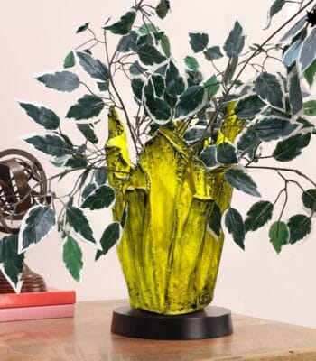 A vibrant addition to any room, the Fluorescent Glow – Decorative Vase Plant Stands decorative vase from Fankaarlok is not just a plant stand but a statement of style. This striking vase features a bold, bright yellow color with a translucent quality that captures and enhances natural light, giving off a luminescent glow that complements the greenery it holds.