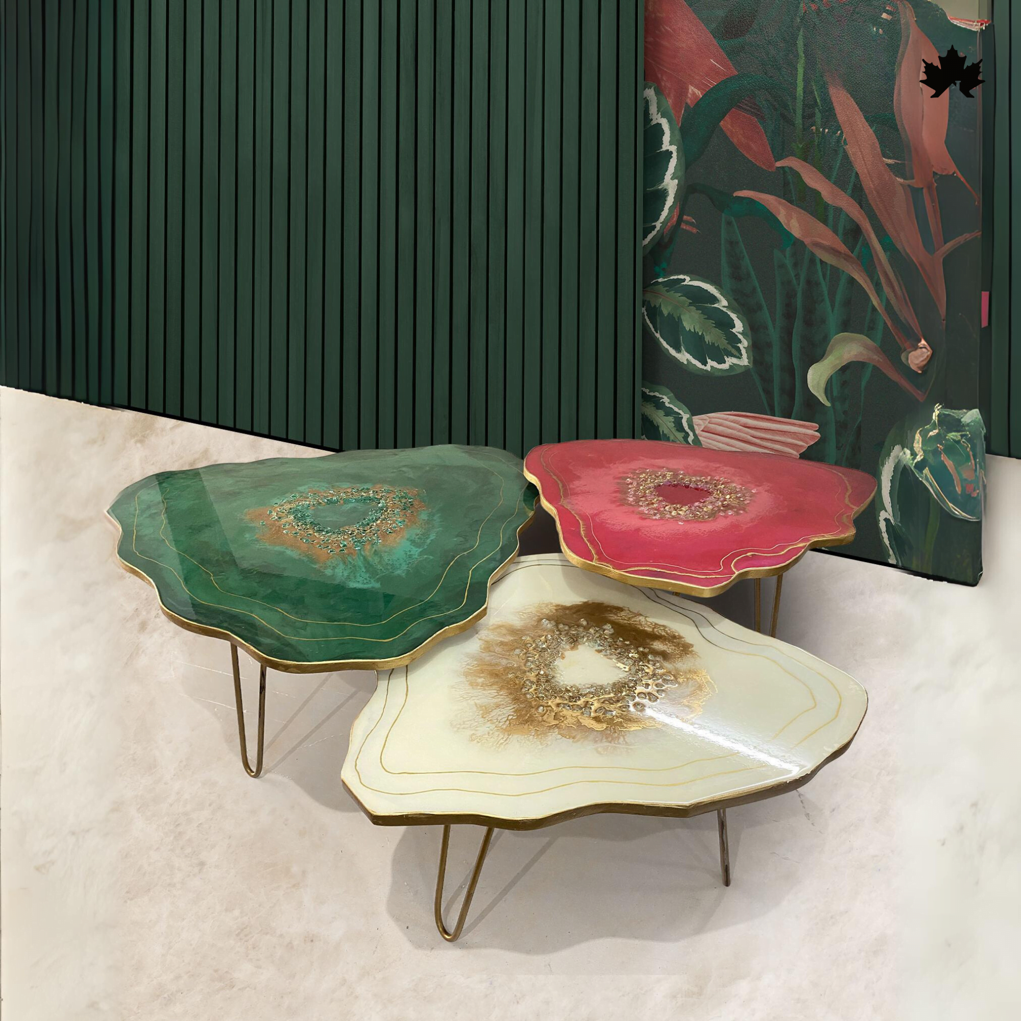 Three artistic resin bespoke agatet ables in varying shapes and vibrant colors of green